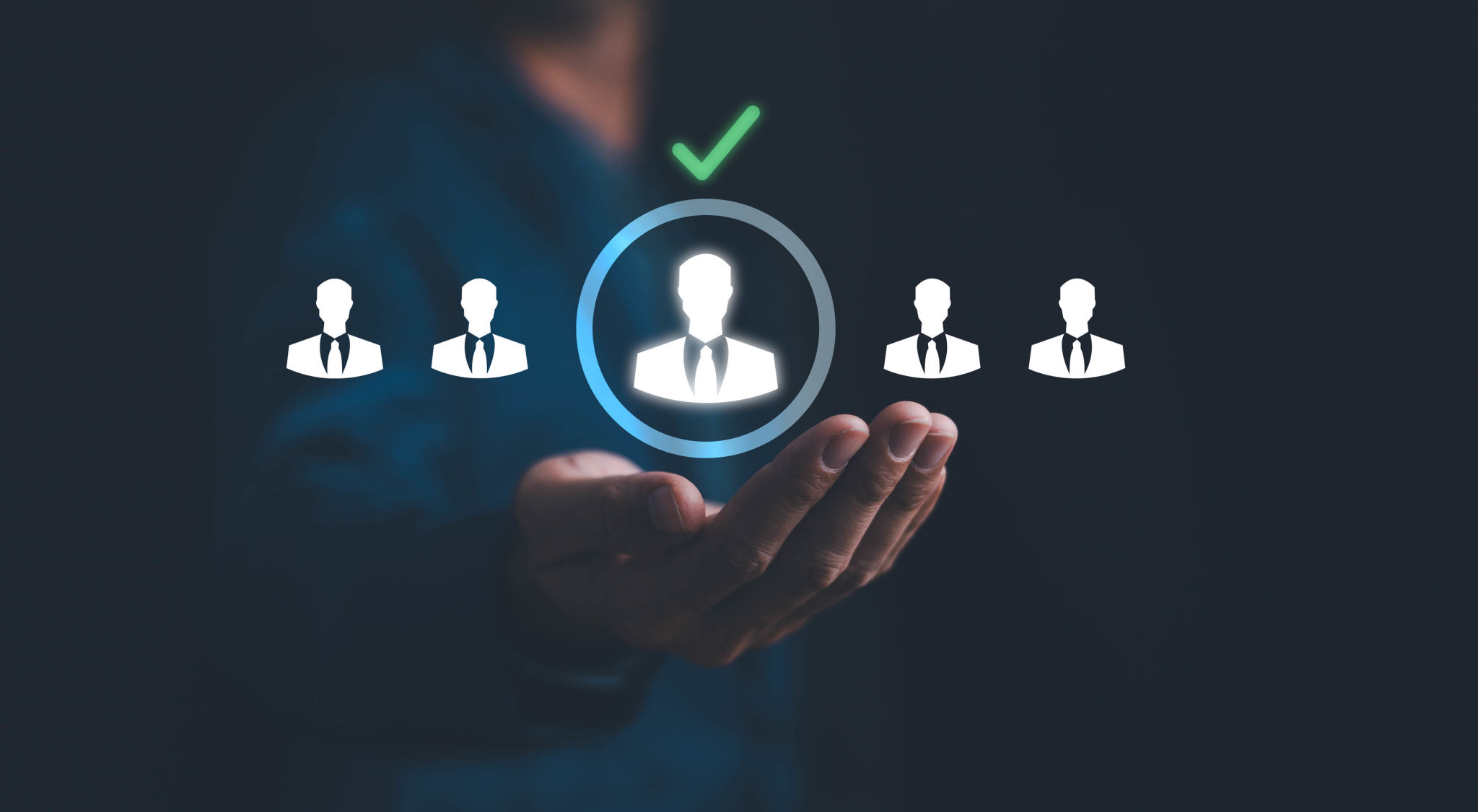 Hand selecting a candidate from a group.